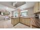 Bright kitchen with updated countertops and ample cabinet space at 27131 Ann Arbor Ave, Punta Gorda, FL 33983