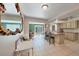 Kitchen with light cabinets, a breakfast bar, and stainless steel appliances at 27131 Ann Arbor Ave, Punta Gorda, FL 33983