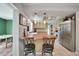 Kitchen boasts stainless steel appliances and an island with seating at 27131 Ann Arbor Ave, Punta Gorda, FL 33983