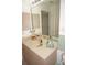Bathroom with large mirror and double vanity at 273 Mark Twain Ln, Rotonda West, FL 33947