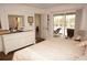 Spacious bedroom with pool view and ample dresser space at 273 Mark Twain Ln, Rotonda West, FL 33947