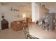 Kitchen with breakfast bar, view into living room at 273 Mark Twain Ln, Rotonda West, FL 33947