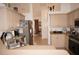 Bright kitchen with light cabinets, stainless steel appliances at 273 Mark Twain Ln, Rotonda West, FL 33947