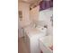 Bright laundry room, washer, dryer, and utility sink at 273 Mark Twain Ln, Rotonda West, FL 33947