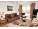 Relaxing living room featuring leather furniture and a pool view at 273 Mark Twain Ln, Rotonda West, FL 33947