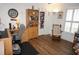 Home office features built-in shelving and hardwood floors at 273 Mark Twain Ln, Rotonda West, FL 33947