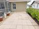 Spacious patio with decorative landscaping at 273 Mark Twain Ln, Rotonda West, FL 33947