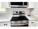 Modern electric cooktop and stainless steel appliances at 2801 Magdalina Dr # 1A, Punta Gorda, FL 33950