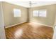 Bedroom with hardwood floors and window at 30105 Oak Rd, Punta Gorda, FL 33982