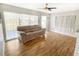 Living room with hardwood floors and sliding doors at 30105 Oak Rd, Punta Gorda, FL 33982