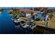 Aerial view of waterfront property with private boat dock and pool at 3335 Purple Martin Dr # 6, Punta Gorda, FL 33950