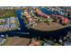 Wide aerial view of waterfront townhouses and canal at 3335 Purple Martin Dr # 6, Punta Gorda, FL 33950