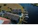 Aerial view of waterfront property with community pool and boat slips at 3335 Purple Martin Dr # 6, Punta Gorda, FL 33950
