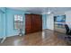Bedroom with wood floors, built in murphy bed and closet at 3335 Purple Martin Dr # 6, Punta Gorda, FL 33950
