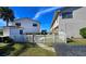 Private fenced yard and building exterior at 3335 Purple Martin Dr # 6, Punta Gorda, FL 33950