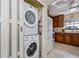 Stackable washer and dryer in a closet at 3335 Purple Martin Dr # 6, Punta Gorda, FL 33950