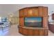 Living room features built-in entertainment center and sofa at 3335 Purple Martin Dr # 6, Punta Gorda, FL 33950