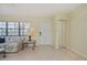 Living room features tiled floors, seating area, and entryway at 3335 Purple Martin Dr # 6, Punta Gorda, FL 33950