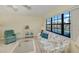 Living room with water view, sofa, and decorative side tables at 3335 Purple Martin Dr # 6, Punta Gorda, FL 33950