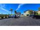 Parking lot with cars parked at 3335 Purple Martin Dr # 6, Punta Gorda, FL 33950