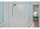 Large shower with white tile and built-in shelves at 3335 Purple Martin Dr # 6, Punta Gorda, FL 33950