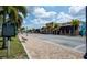 Brick-paved town square featuring local businesses and historical marker at 3335 Purple Martin Dr # 6, Punta Gorda, FL 33950