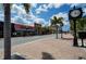 Scenic town square with palm trees and brick sidewalks at 3335 Purple Martin Dr # 6, Punta Gorda, FL 33950