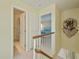 Upstairs hall with bathroom and bedroom access at 3335 Purple Martin Dr # 6, Punta Gorda, FL 33950