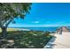 Scenic waterfront park with pier and tranquil seating area at 3335 Purple Martin Dr # 6, Punta Gorda, FL 33950