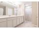 Double vanity bathroom with a walk in shower at 3495 Levee St, North Port, FL 34288