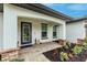 Front entry of the home with paver walkway at 3495 Levee St, North Port, FL 34288