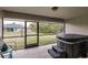 Hot tub and patio with backyard view at 3495 Levee St, North Port, FL 34288