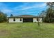 Single story home with large backyard at 3495 Levee St, North Port, FL 34288