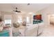 Open living room with access to backyard at 3495 Levee St, North Port, FL 34288