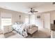 Spacious bedroom with ceiling fan and ample closet space at 3495 Levee St, North Port, FL 34288