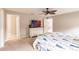 Bright bedroom with ceiling fan and TV at 3495 Levee St, North Port, FL 34288