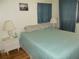 Bedroom with double bed and white nightstand at 5232 Palena Blvd, North Port, FL 34287