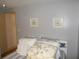 Cozy bedroom with double bed and light blue bedding at 5232 Palena Blvd, North Port, FL 34287