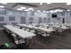 Spacious community room with numerous tables and chairs at 5232 Palena Blvd, North Port, FL 34287