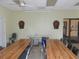 Community room with long tables, chairs, and dartboards at 5232 Palena Blvd, North Port, FL 34287