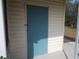 Exterior shed with light blue door at 5232 Palena Blvd, North Port, FL 34287