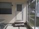 View of backyard with shed and screened porch at 5733 Holiday Park Blvd, North Port, FL 34287