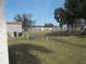 Mobile home community with grassy areas at 5733 Holiday Park Blvd, North Port, FL 34287