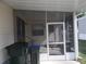 Screened porch with concrete floor and steps at 5733 Holiday Park Blvd, North Port, FL 34287