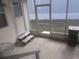 Screened porch with access to backyard at 5733 Holiday Park Blvd, North Port, FL 34287
