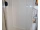 Simple shower stall with white walls at 5733 Holiday Park Blvd, North Port, FL 34287