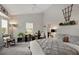 Main bedroom with a large bed, rocking chair, and window at 102 Linda Lee Dr, Rotonda West, FL 33947