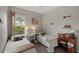 Two twin beds, a desk, and window with natural light at 102 Linda Lee Dr, Rotonda West, FL 33947