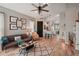 Bright living room with hardwood floors, comfortable seating, and stylish decor at 102 Linda Lee Dr, Rotonda West, FL 33947