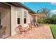 Outdoor patio with seating area, adjacent to the house at 102 Linda Lee Dr, Rotonda West, FL 33947
